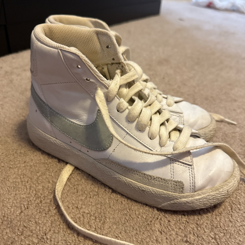 Nike White High-Top Sneakers with Light Blue Swoosh